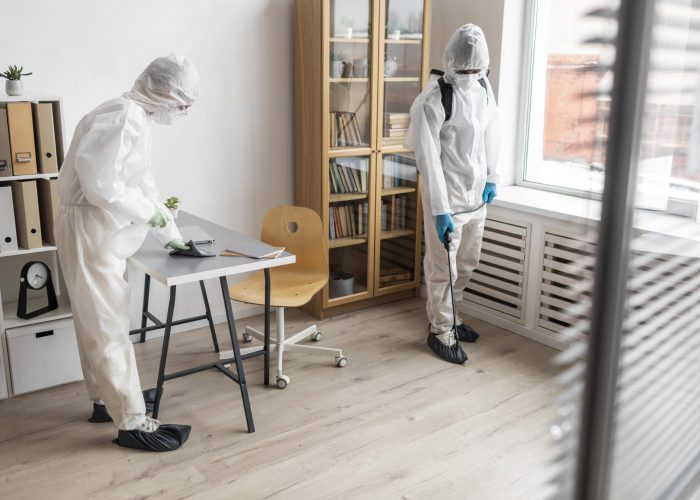 people-wearing-protective-equipment-disinfecting-dangerous-area